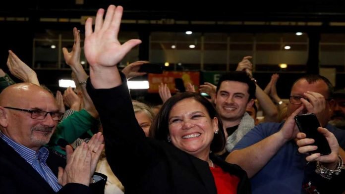 Sinn-Fein-leader-Mary-Lou-McDonald-reacts-after-the-announcement-of-early-voting-results-in-a-counting-center-in-Dublin-on-Sunday. (1)